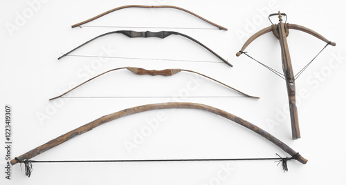 medieval wooden bows and crossbow isolated on white background