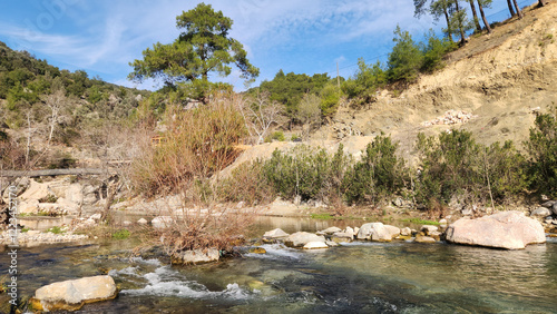 Flowing through the village of Dokuzoluk Recreation Area the Karaisali district of Adana province, the mesmerizing view of Eglence River provides a restful sight perfect for a weekend activity. photo