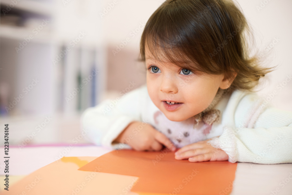 little child girl sitting at the table at home, child development. little child girl sitting at the table at home, child development.