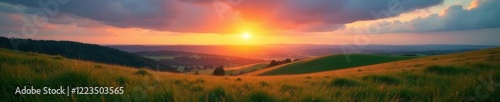 Wallpaper Mural Serene landscape with rolling hills under a cloudy sky at sunrise, landscape, rolling hills, cloudy skies Torontodigital.ca