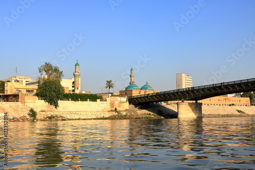 Fototapeta Naklejka Na Ścianę i Meble -  Baghdad, Bagdad, Iraq - November 15 2024: Outdoor view of Tigris riverbank from the river