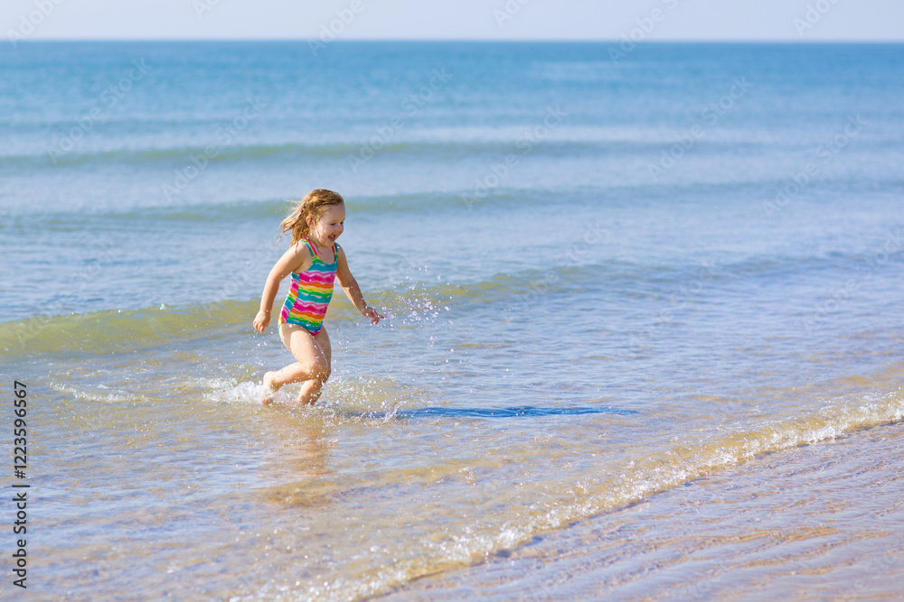 Kids playing on beach. Children play at sea. Kids playing on beach. Children play at sea.