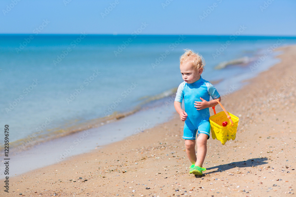 Kids playing on beach. Children play at sea. Kids playing on beach. Children play at sea.