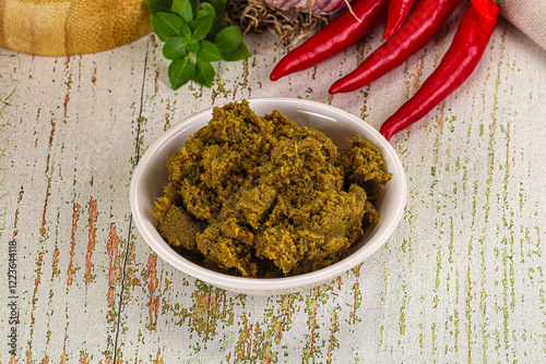 Yellow Thai spicy curry paste photo