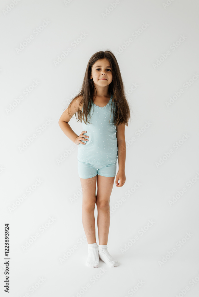 Cute little girls in pajamas studio full length portrait Cute little girls in pajamas studio full length portrait