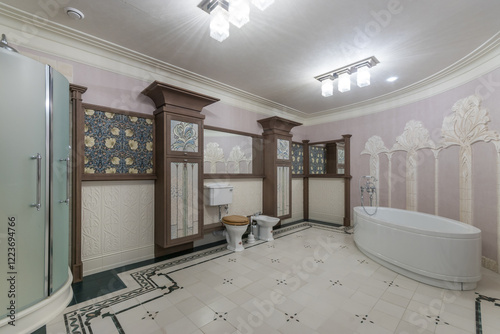 Elegant bathroom interior in neoclassical style. Exclusive room decor elements and .stylish accessories. photo