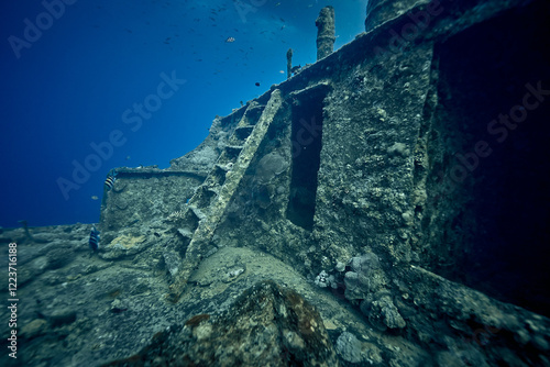 Obraz na płótnie Mysterious underwater view on deck the ship wreck of SS Thistlegorm - British cargo steamship sunk by German bomber in the Red Sea, near Sharm El Sheikh, Egypt. Underwater photography and travel w salonie