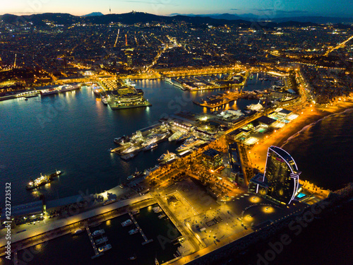 Evening view of Barceloneta and Port Vell. Barcelona. Spain photo