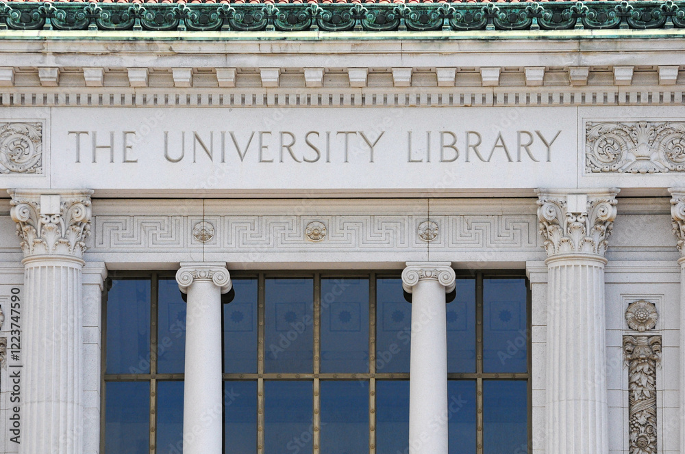 Obraz premium Berkeley, California, USA. April 26, 2012: Facade of The University Library at the University of California, Berkeley, featuring classical columns and decorative architecture.