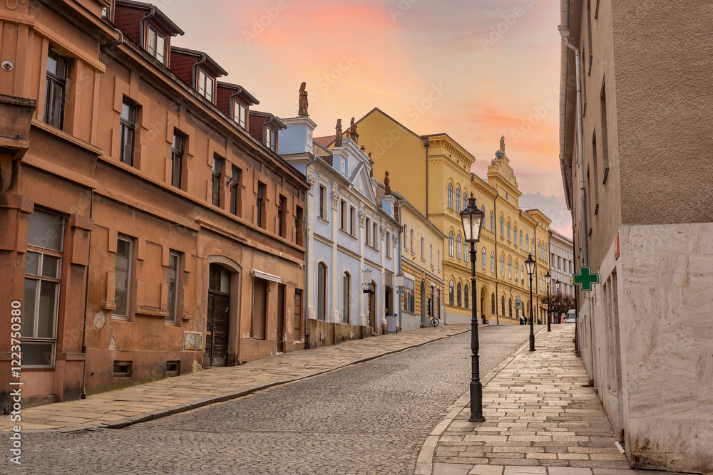 Narrow picturesque street with baroque and renaissance historical buildings. Cityscape of medieval town Pisek, Czechia.