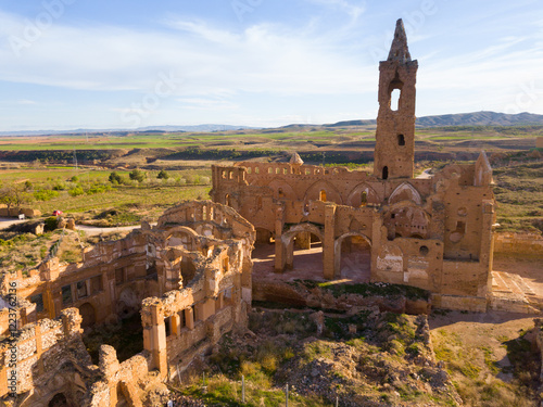 Aerial view of remains of old church tower on ruins of historic town of Belchite, Zaragoza, Spain..
