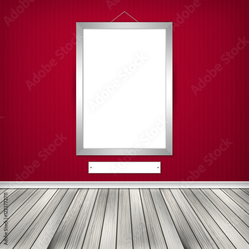 Gallery interior with one empty frame on wall.