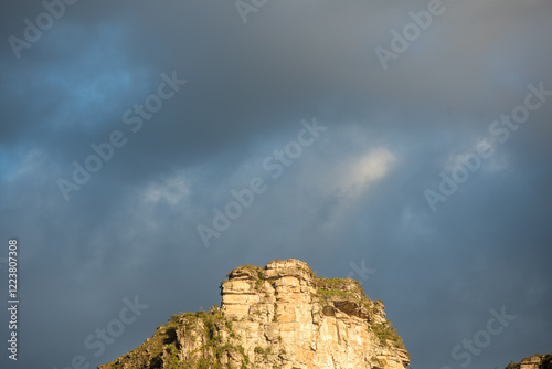 tall rock and detailed formations with a clear blue sky background in chapada diamantina photo