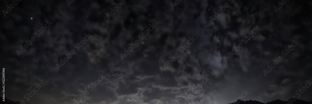 Fototapeta premium Dark night sky with twinkling stars against a black canvas, universe, astronomy