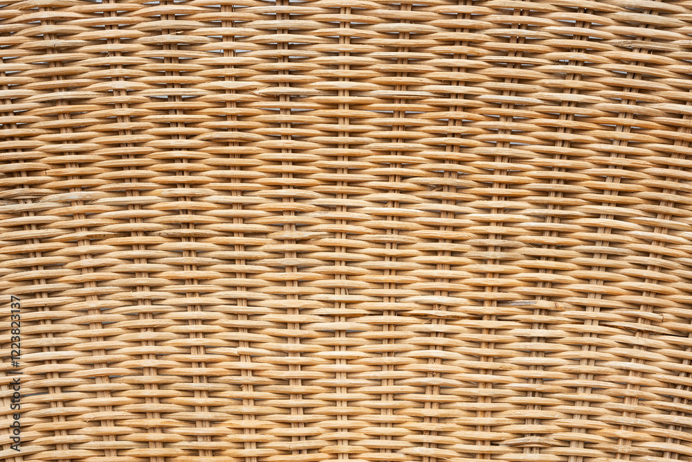 An intricately woven rattan which is used in furniture, artwork, background designs, and copyspace An intricately woven rattan which is used in furniture, artwork, background designs, and copyspace