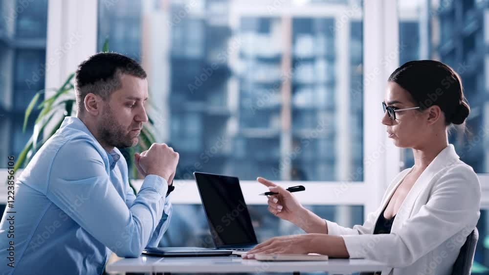 A female financial consultant, lawyer, or bank manager advises a client, reviewing legal documents and planning taxes. Concept of professional consulting and business solutions.