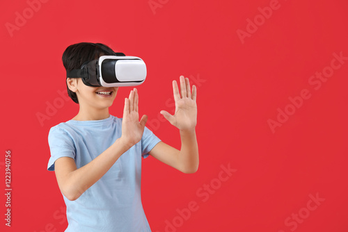 Little boy using VR glasses...