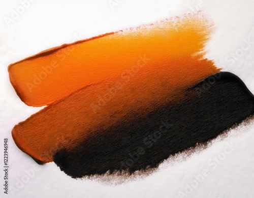 Orange and Black Paint Swatches on White Background photo