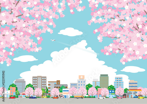 桜咲く春の街並みのイラスト.