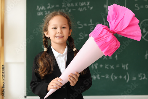 Happy little girl with pink...