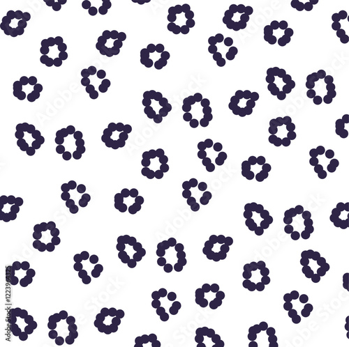 The dots are clustered into separate circular objects or rings, somewhat reminiscent of the outline of a raspberry.