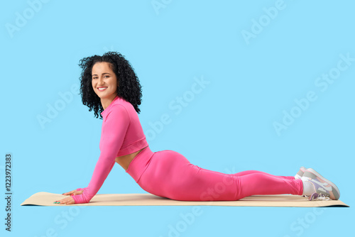 Sporty adult woman practici...