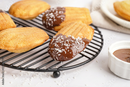 Chocolate dipped madeleine ...