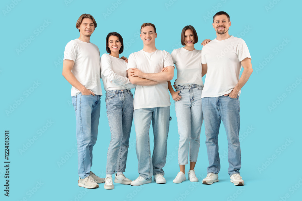Fototapeta premium Group of young people in jeans on blue background