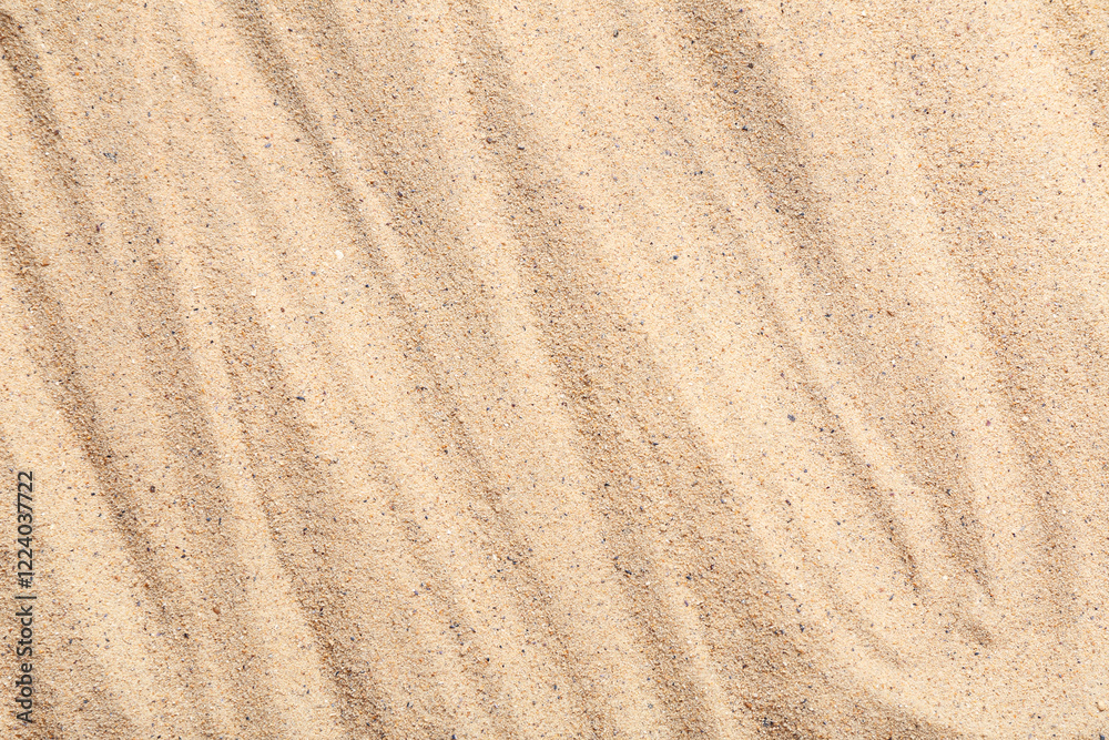 Texture of sand with lines, closeup Texture of sand with lines, closeup