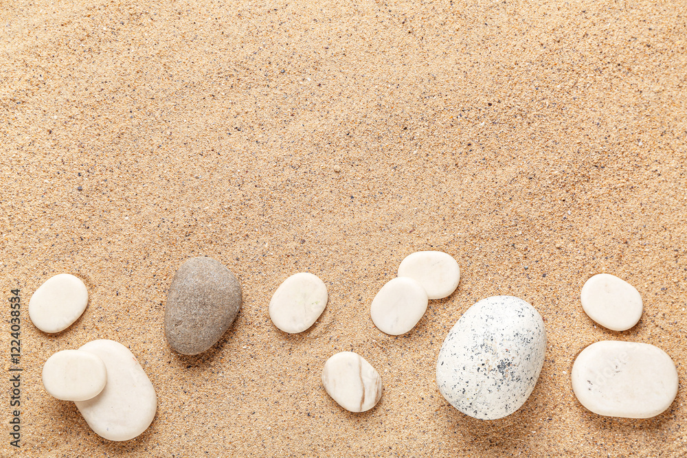 Different pebbles on beach sand Different pebbles on beach sand
