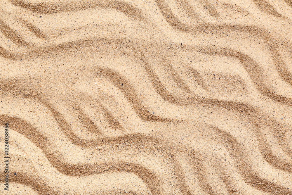Texture of beach sand with waves as background Texture of beach sand with waves as background