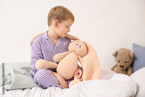 Cute little boy with knitte...