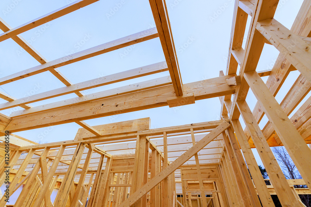 Obraz premium Constructing wooden frame structure with beams trusses in residential area