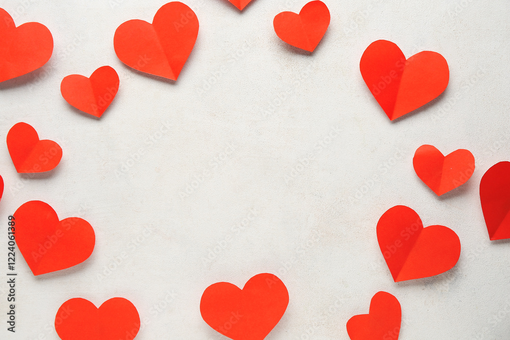 Frame made of red paper hearts on white grunge background. Valentine's Day celebration Frame made of red paper hearts on white grunge background. Valentine's Day celebration