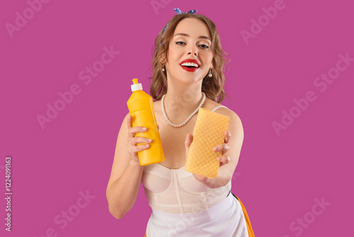 Young pin-up housewife with...