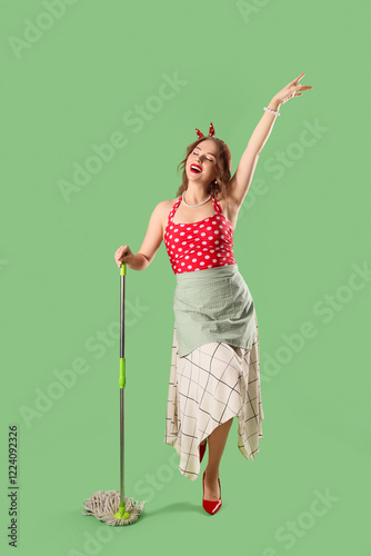 Young pin-up housewife with...