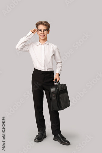 Teenage businessman with br...