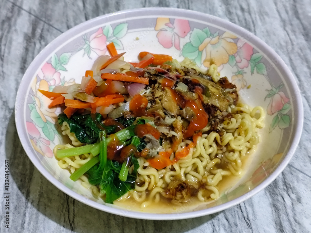 Mie, Mie ayam, mi ayam, or bakmi ayam is a common Indonesian dish consisting of seasoned yellow wheat noodles topped with chicken pieces. This dish originates from Chinese culinary techniques. Mie, Mie ayam, mi ayam, or bakmi ayam is a common Indonesian dish consisting of seasoned yellow wheat noodles topped with chicken pieces. This dish originates from Chinese culinary techniques.