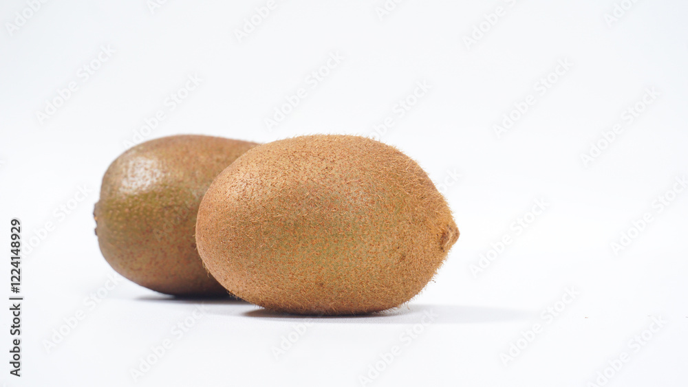 Green whole kiwi fruits isolated on white background Green whole kiwi fruits isolated on white background