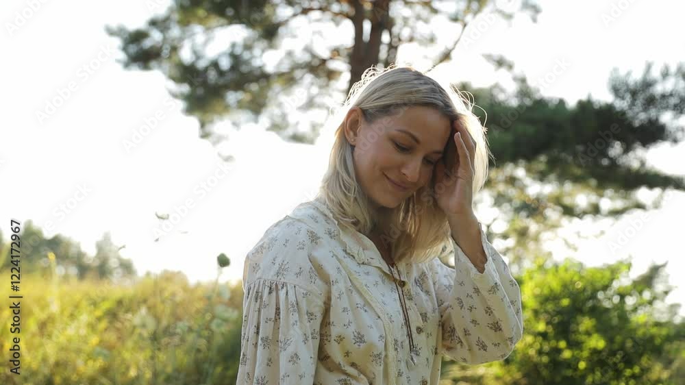 A contemplative woman enjoys being in nature surrounded by sunlights warm glow and beauty A contemplative woman enjoys being in nature surrounded by sunlights warm glow and beauty
