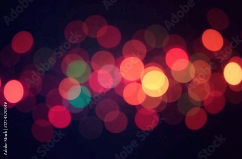 Abstract multicolored bokeh balls on a dark background, festive overlay texture for photo editing, blurred bright round shapes for a creative graphic design background