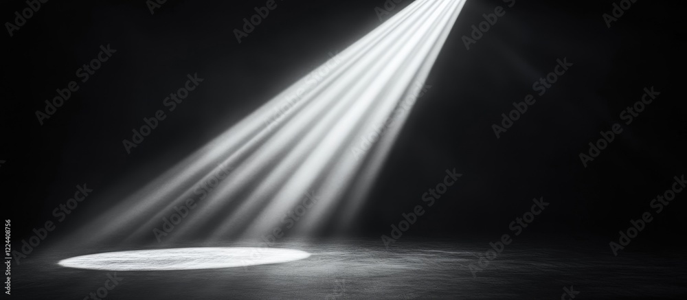 Obraz premium Single spotlight shining on dark floor.