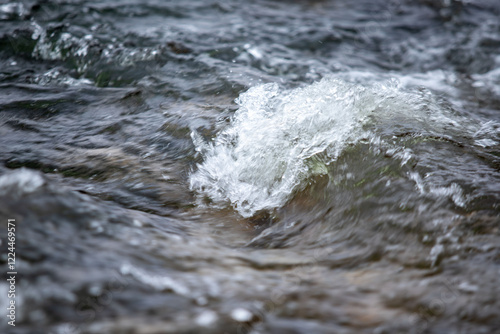 The water is choppy and the waves are crashing
