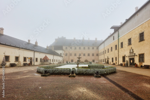 Castle of Cerveny Kamen in Slovakia at mist photo