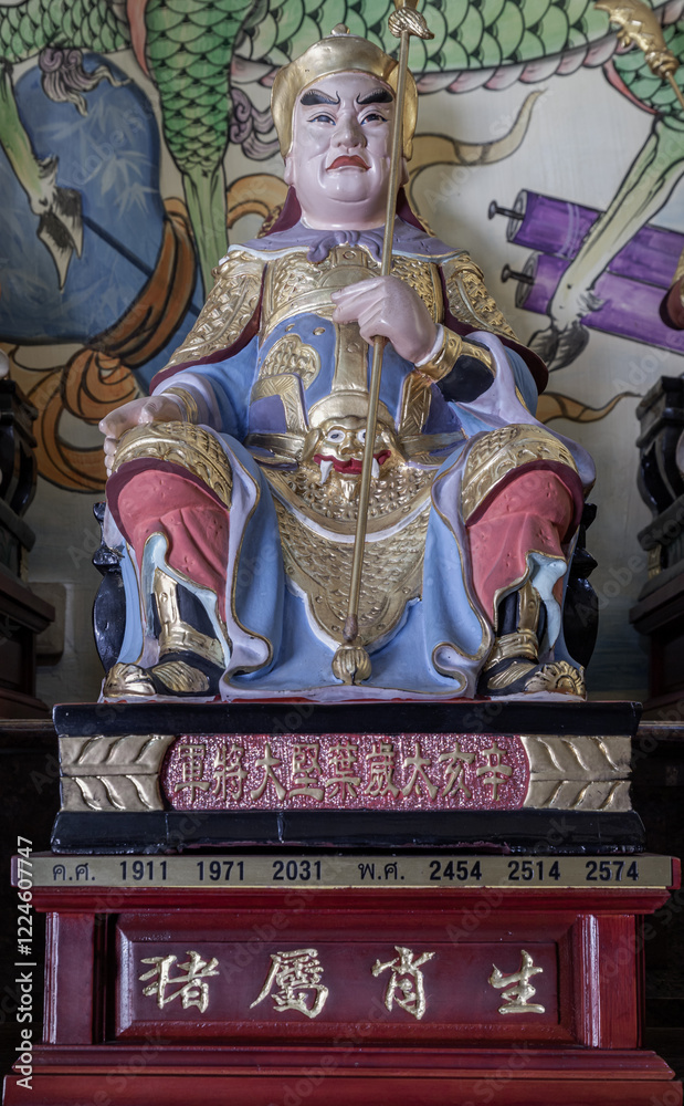 Statue of Ye Jian. The great guardian deity of the year Xin Hai - Zodiac Pig (born on 1911, 1971, 2031) governed by Tai Sui God, use it as your Wallpaper, Poster and Space for text, Selective focus.