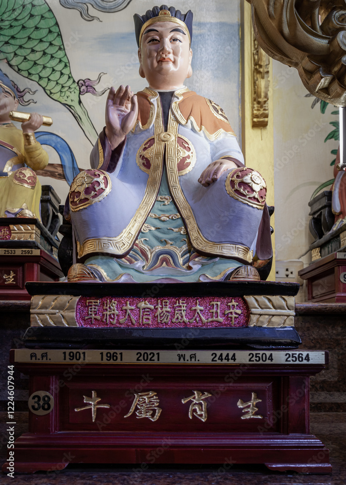 Statue of Tang Xin. The great guardian deity of the year Xin Chou - Zodiac Ox (born on 1961, 2021, 2081) governed by Tai Sui God, use it as your Wallpaper, Poster and Space for text, Selective focus.