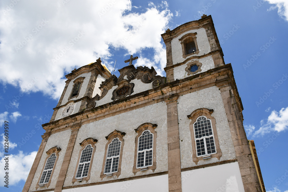 Fototapeta premium The Church of Our Lord of Bonfim, in Salvador, Bahia, is a symbol of faith and religious syncretism. Famous for the Lavagem do Bonfim and its colorful ribbons, attracting devotees and tourists.