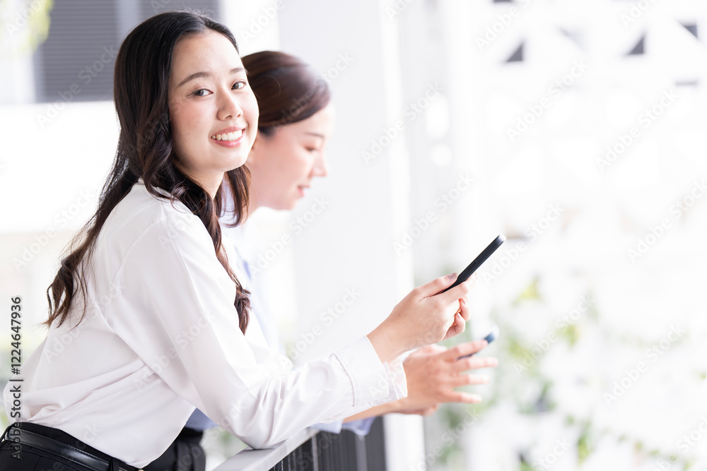 Professional Businesswoman using smartphone outdoors Professional Businesswoman using smartphone outdoors