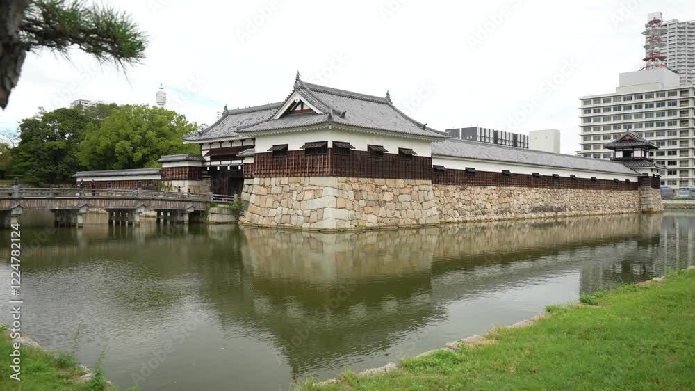 View of Omotegomon (Main Gate) and moat, entrance to Hiroshima Castle, Motomachi, Naka Ward, Hiroshima, Honshu, Japan View of Omotegomon (Main Gate) and moat, entrance to Hiroshima Castle, Motomachi, Naka Ward, Hiroshima, Honshu, Japan