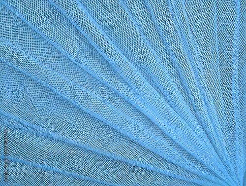 Light Blue Net Fabric Forms Diagonal Lines with Delicate Texture Gently Folded for Background
